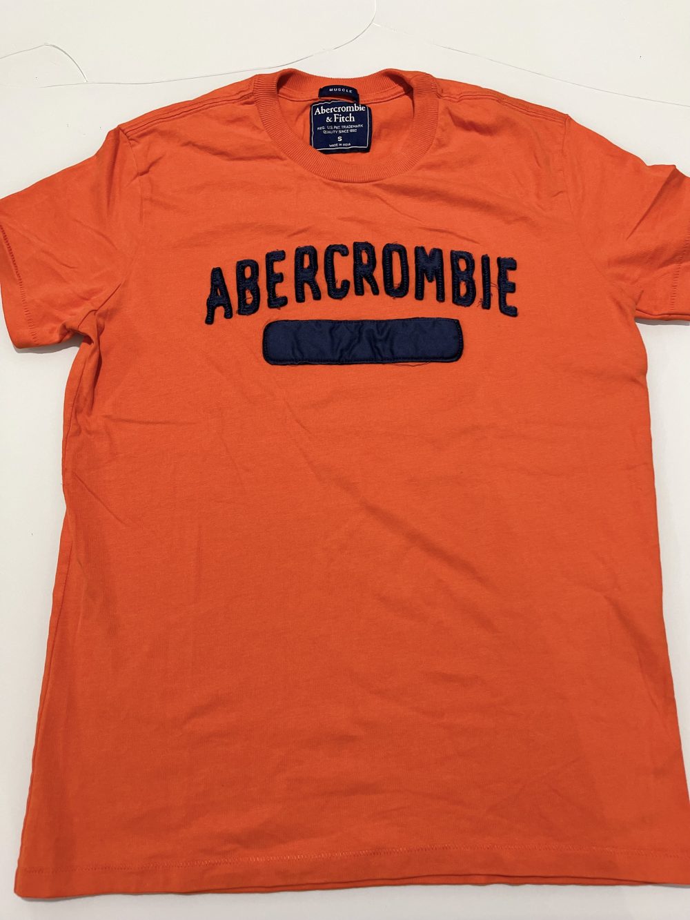 GRIFE PERUANA ABERCROMBIE LARANJA